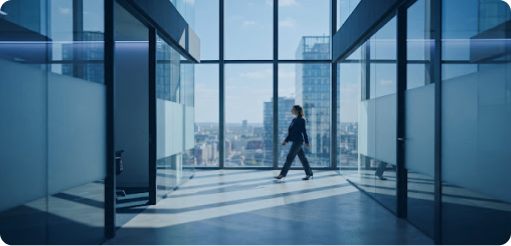 Modern office hallway overlooking a city skyline